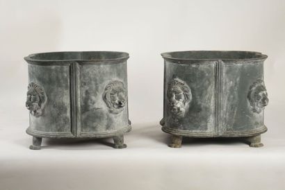 A pair of cast iron planters, four-lobed...