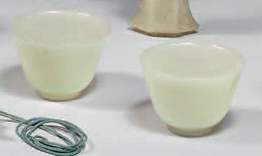 CHINE - XXe siècle.
A pair of small celadon...