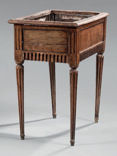 Mahogany planter molded and carved with channels...