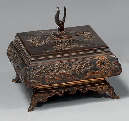 
A quadrangular box in patinated and gilt...