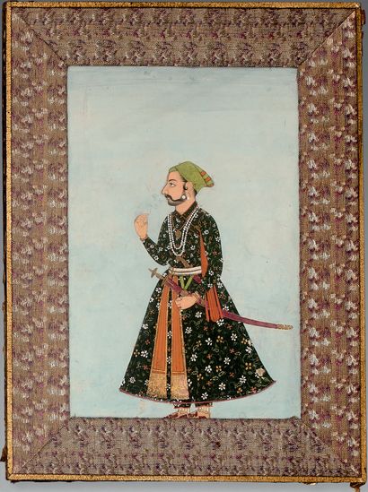 Mughal miniature depicting a prince dressed...