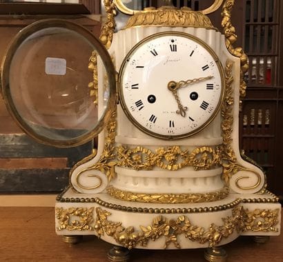 White marble and gilt bronze clock. The dial...