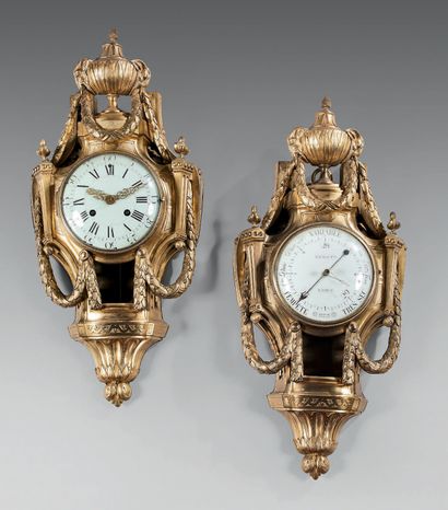 Barometer and gilt bronze cartel pendant.
The...