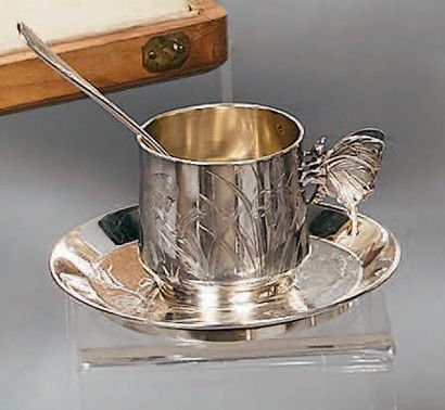 Small silver cup and its saucer (800). The...