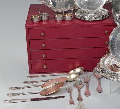 Part of a silver cutlery set (800), the handle...