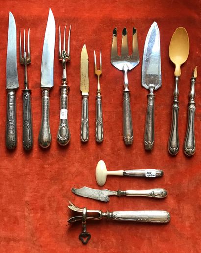 A set of silver cutlery with stuffed handle...