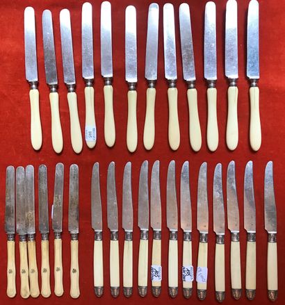 Two sets of twelve fruit knives with ivory...