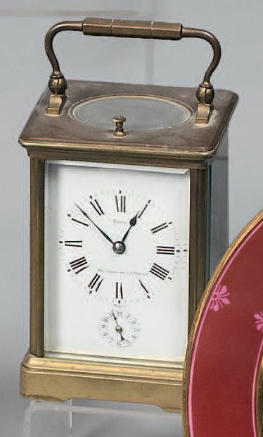 Pendulette à cage en bronze, le cadran marqué...