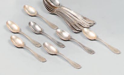 Part of a silver cutlery set (800), the handle...