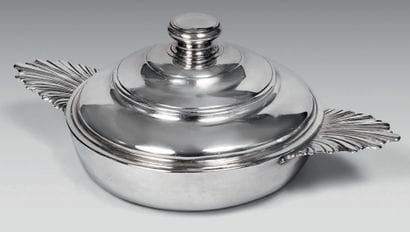 Round silver bowl with ears, the handles...