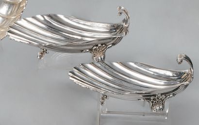 A pair of silver shell-shaped bowls (800)....