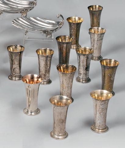 Suite of twelve silver goblets (800), the...