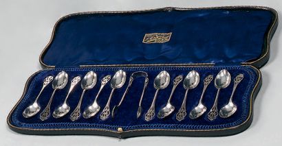 Twelve English silver coffee spoons and sugar...