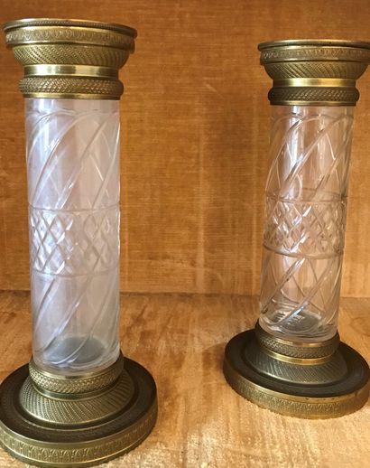 Pair of column torches, the shaft in cut...