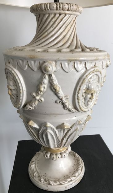 White glazed earthenware vase in the form...