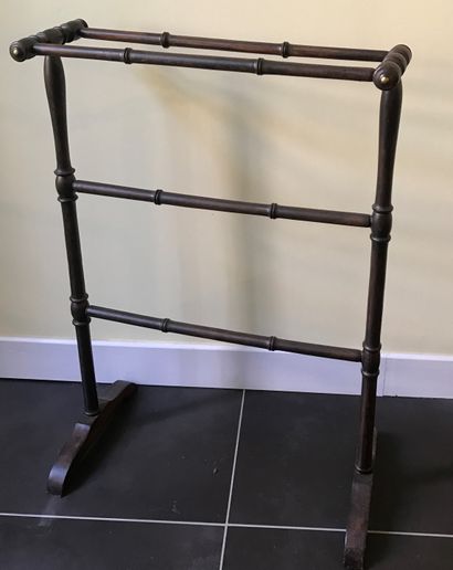 Towel rack in natural wood stained in imitation...