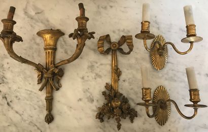 Wall sconce in gilt bronze, the two arms...