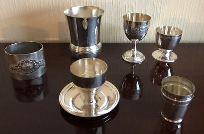 Set in silver plated metal: a tumbler; a...