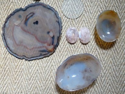 Set of hard stones: two small rose quartz...