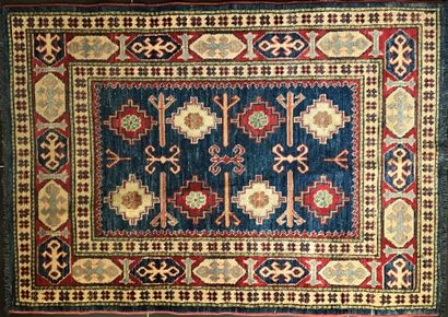 Lot composed of : 

- two carpets with Caucasian...