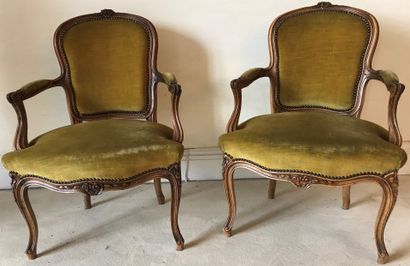 Pair of armchairs in natural wood, moulded...