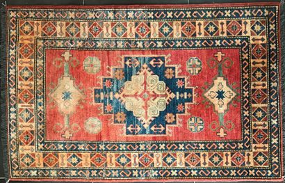Lot composed of : 

- two carpets with Caucasian...