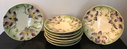 Suite of eight plates in earthenware barbotine...