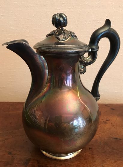 A 925 silver coffee pot with a fruit on the...