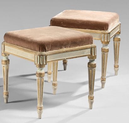 Pair of stools in grey and gilded wood. The...