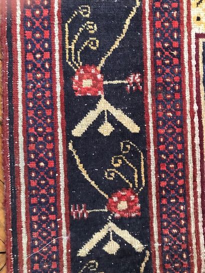 Oriental wool carpet. Decorated in the center...