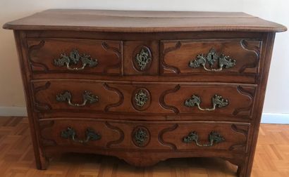 Moulded fruitwood chest of drawers, the slightly...