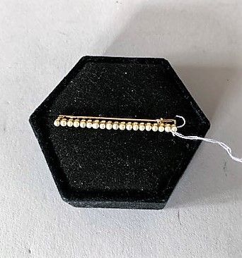 Broche barrette en or jaune 18K (750), formée...