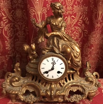 Pendule en régule doré à sujet d’une jeune...
