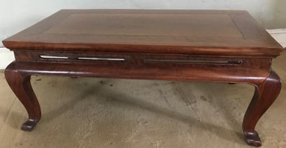 Table basse en palissandre, le plateau angulaire,...