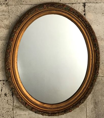 Miroir à entourage ovale en bois redoré et...