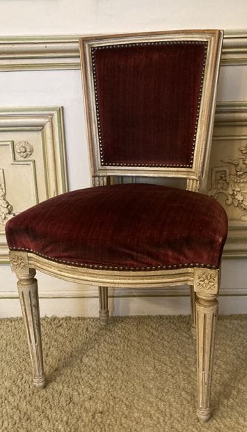 Suite of ten chairs in cream lacquered wood...
