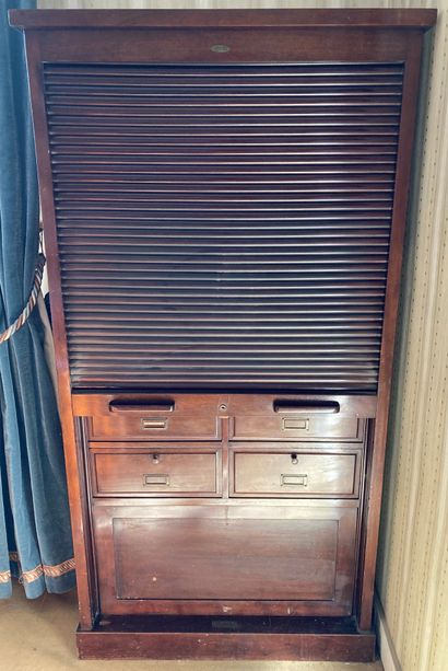 Varnished mahogany filing cabinet. The sliding...