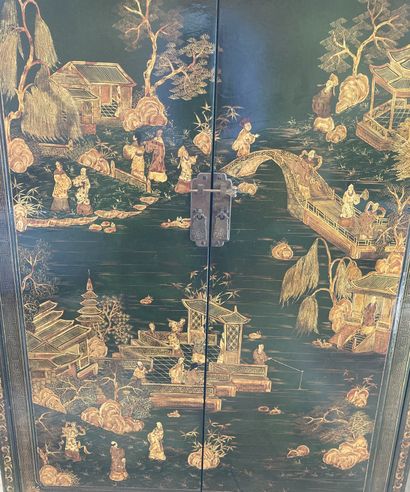A piece of furniture with gold lacquer decoration...