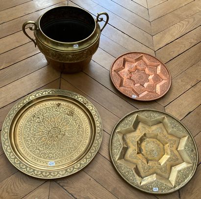 
Three copper trays with engraved and embossed...