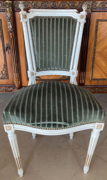 Suite of four chairs and a matching armchair...