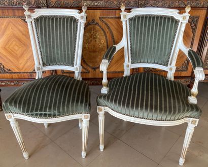 Suite of four chairs and a matching armchair...