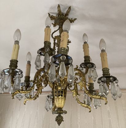 A cast bronze chandelier with nine lights...