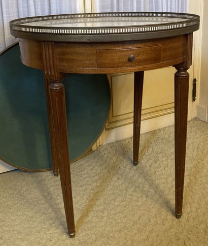 Mahogany bouillotte table, the top of marble...