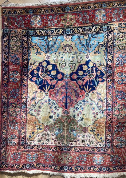 Oriental wool carpet. Decorated with birds...