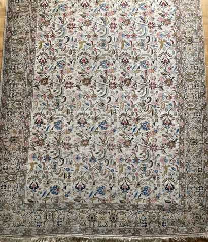 Persian wool carpet decorated with flowering...