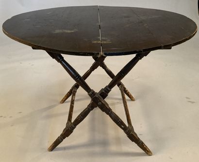 Table in natural wood stained and varnished....