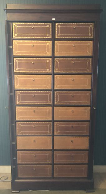 A mahogany and mahogany veneer chest of drawers...