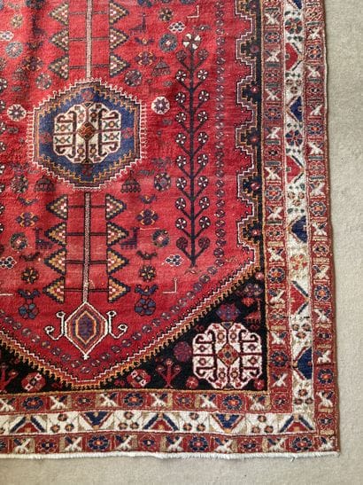 Oriental wool carpet decorated with a hexagonal...