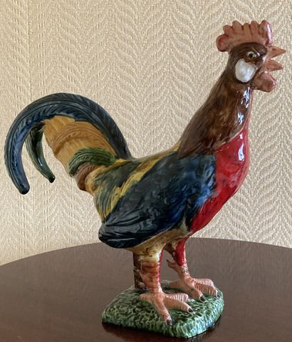 
Statue de coq en faïence polychrome. 




H....