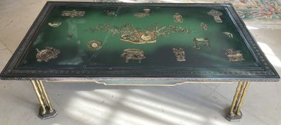 A Chinese lacquered coffee table, decorated...